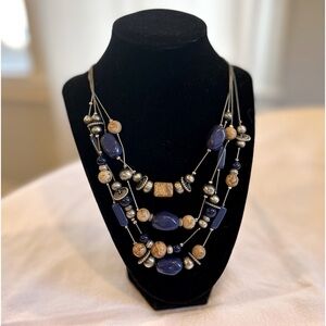 Chico’s necklace 4 strands, blue lapis and neutral colored beads. New condition!
